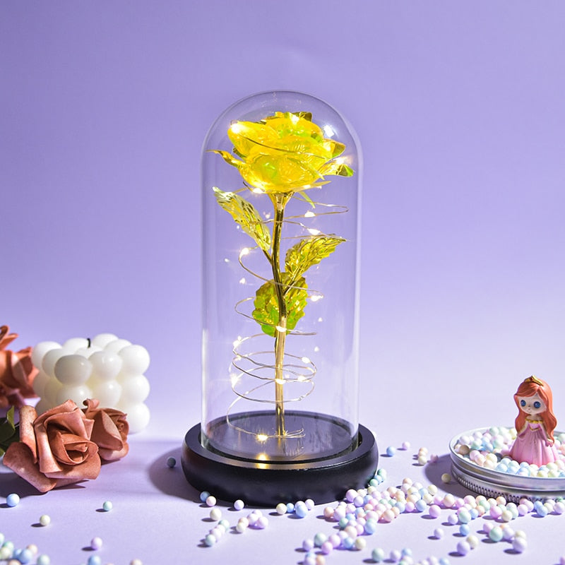 Galaxy preserved rose gift with shimmering petals inside glass dome