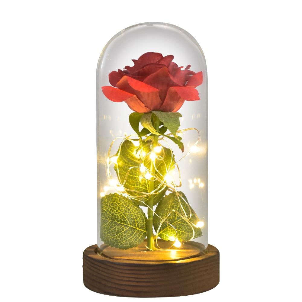Preserved rose gift on bedside table creating romantic ambiance with LED light