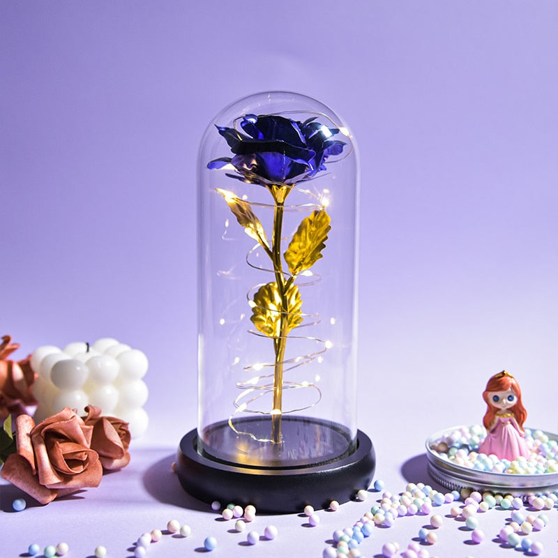 Galaxy preserved rose gift with shimmering petals inside glass dome