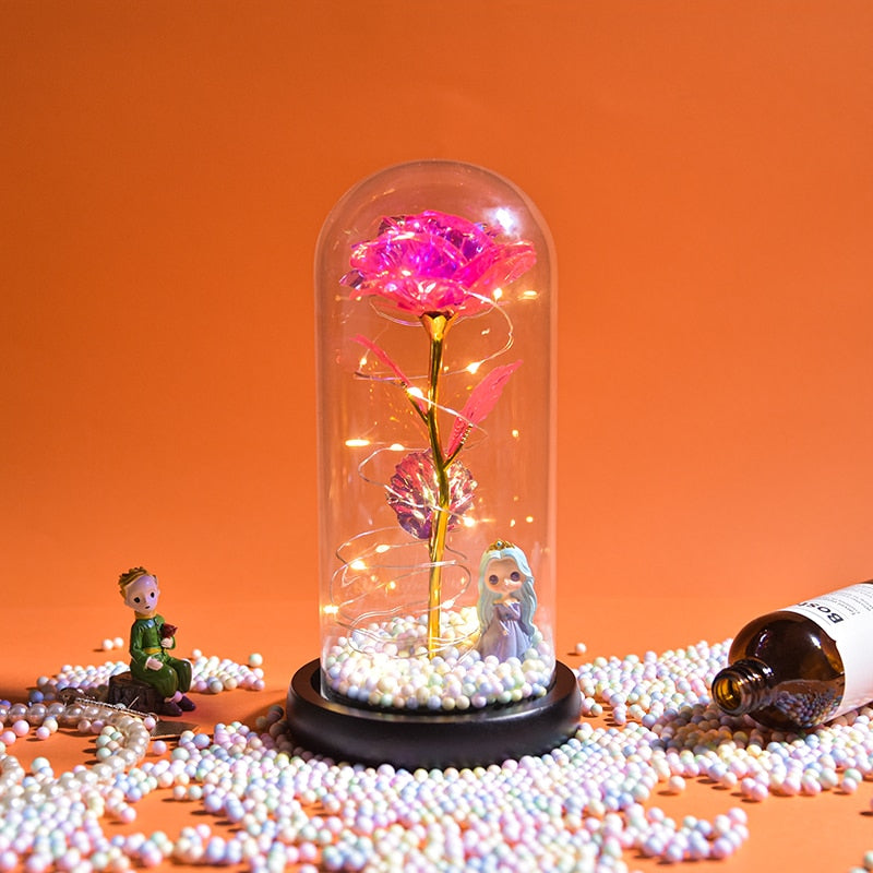 Preserved rose gift on bedside table creating romantic ambiance with LED light