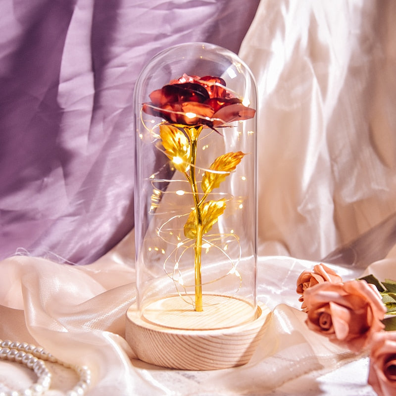 Preserved rose gift on bedside table creating romantic ambiance with LED light