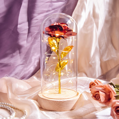Preserved rose gift on bedside table creating romantic ambiance with LED light