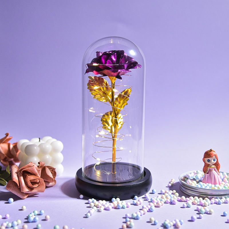 Preserved rose gift on bedside table creating romantic ambiance with LED light