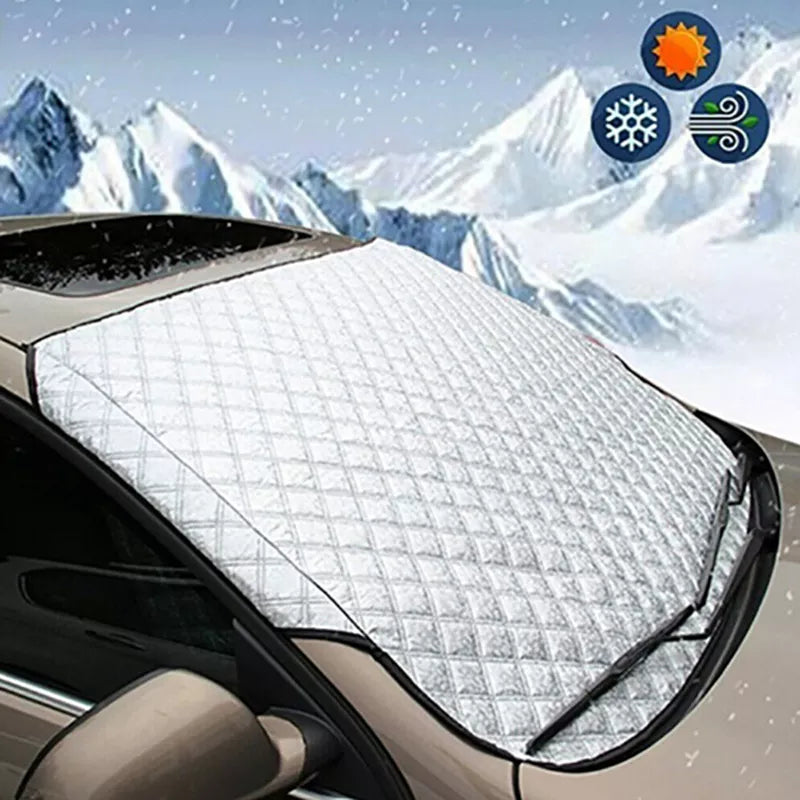 Windshield cover installed on car front glass - all season sun and snow protection